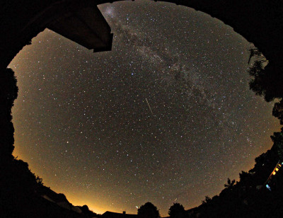 "Cloud" entering the field of view, but a satellite track, the one in the middle of the picture, is already there (first stage ?)